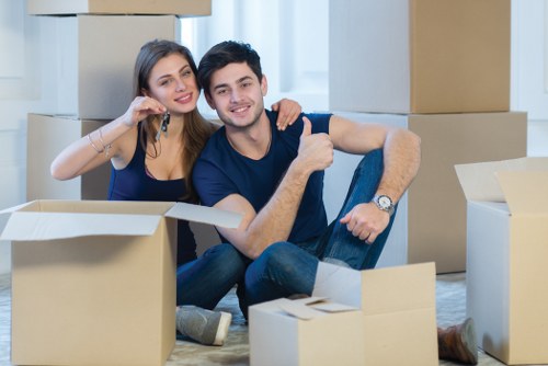 Moving team preparing items for transport during a house move