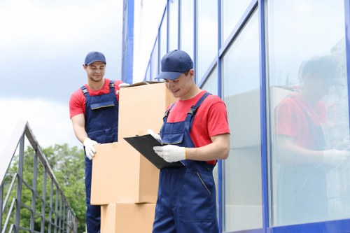 Same day removals team handling a Docklands apartment move