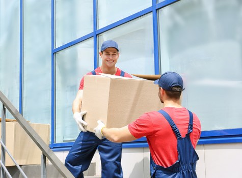 Boxes and furniture prepared for a Docklands relocation in a riverside flat