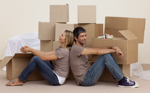 Careful loading of sofas and tables for Docklands removals