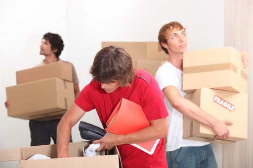 Removal van loaded with household boxes and furniture