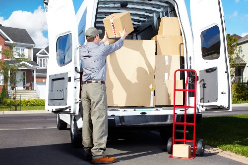 Removal team planning a Docklands move near modern apartments