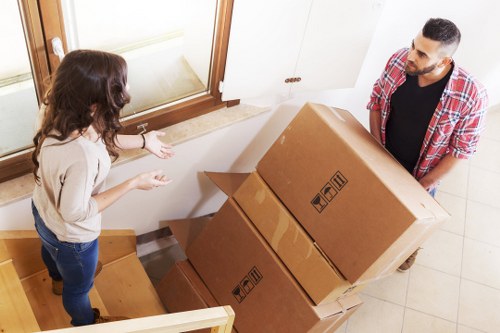 Professional packing process with labelled boxes in Docklands