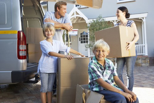 Careful loading of household items during a move in Docklands