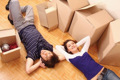 Local movers loading furniture for urgent Docklands relocation